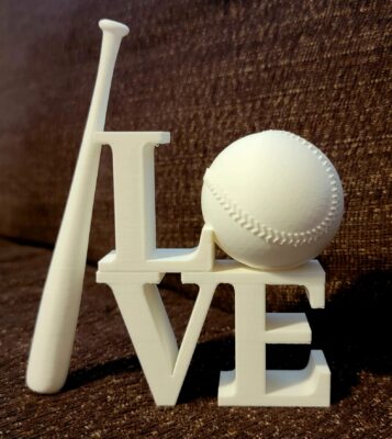 Paintable item with LOVE with a baseball O and a leaning baseball bat